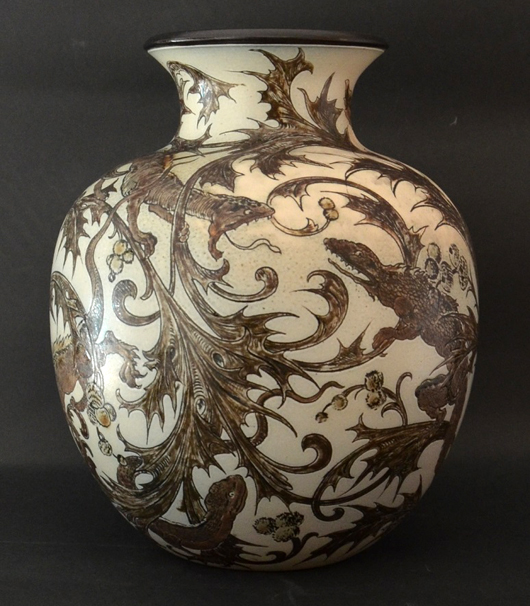 Martin Brothers vase with dragons, 10in. tall, 1894, £12,500, from Kinghams Art Pottery Ltd. The Mayfair Antiques & Fine Art Fair image